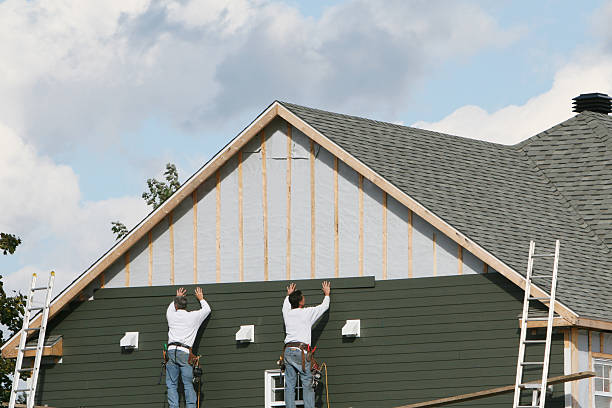 Professional Siding Replacement technician working in Downers Grove, IL
